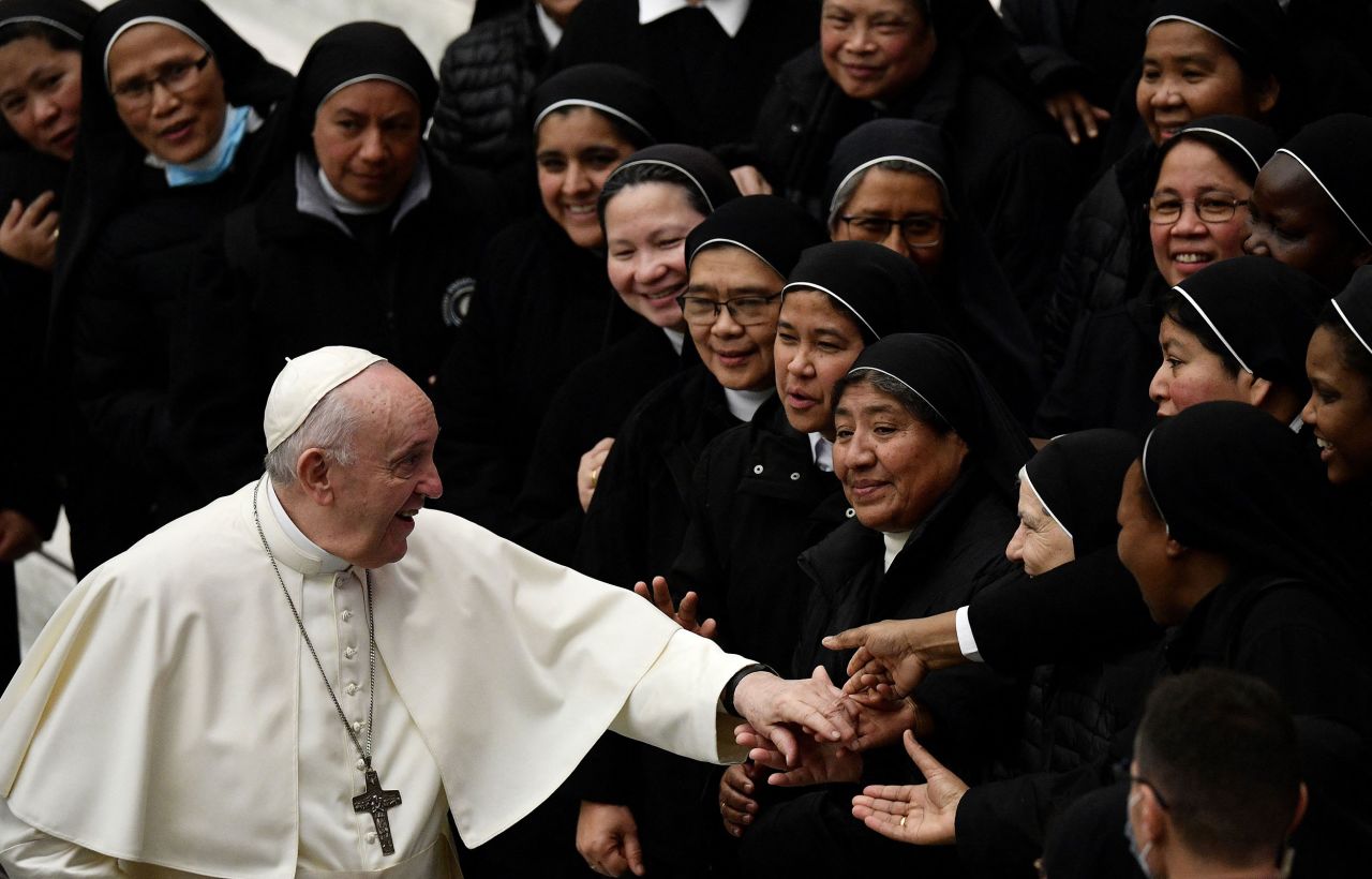 Pope Francis greets nuns visiting the Vatican on Wednesday, December 1.