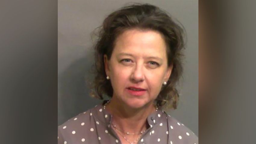 This jail booking photo provided by Glynn County Sheriff's Office, shows Jackie Johnson, the former district attorney for Georgia's Brunswick Judicial Circuit, after she turned herself in to the Glynn County jail in Brunswick, Ga, on Wednesday, Sept. 8, 2021.  A grand jury indicted Johnson on charges of violating her oath of office and obstructing police in her handling of the February 2020 killing of Ahmaud Arbery. The indictment accuses Johnson of using her position to try to shield Arbery's killers from prosecution. She has denied any wrongdoing.  (Glynn County Sheriff's Office via AP)