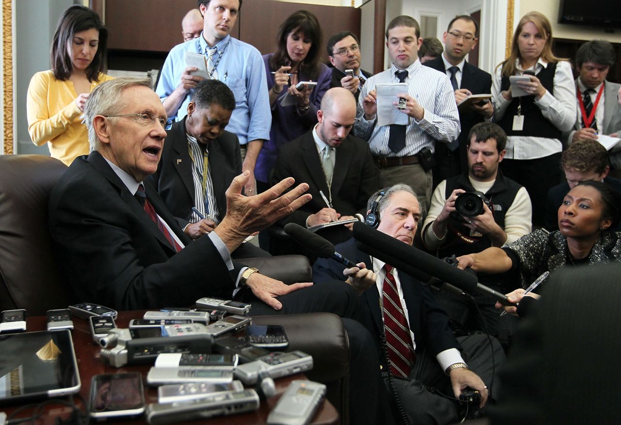 Reid speaks to members of the press during a news briefing in 2011.