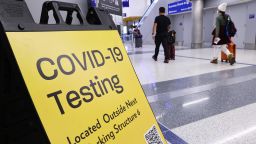A sign promotes a COVID-19 testing location located inside the Tom Bradley International Terminal at Los Angeles International Airport (LAX) on December 1, 2021 in Los Angeles.