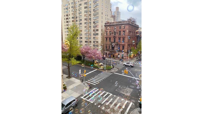 <strong>Quarantine bubble: </strong>Duriau encouraged members of the Facebook group to upload photos of the views from their homes. Jessica Lavoie took this photo in April 2020, from her home in New York City, USA. "The bubbles we shoot out the window at 7 p.m. during clapping time for essential workers has become our favorite thing to do," Lavoie wrote in her post in September 2020.