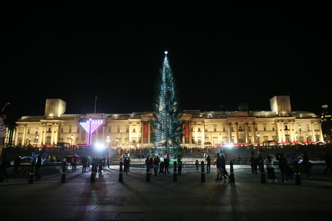 The Norwegian tree was lit during a ceremony at Trafalgar Square in London on Thursday evening.