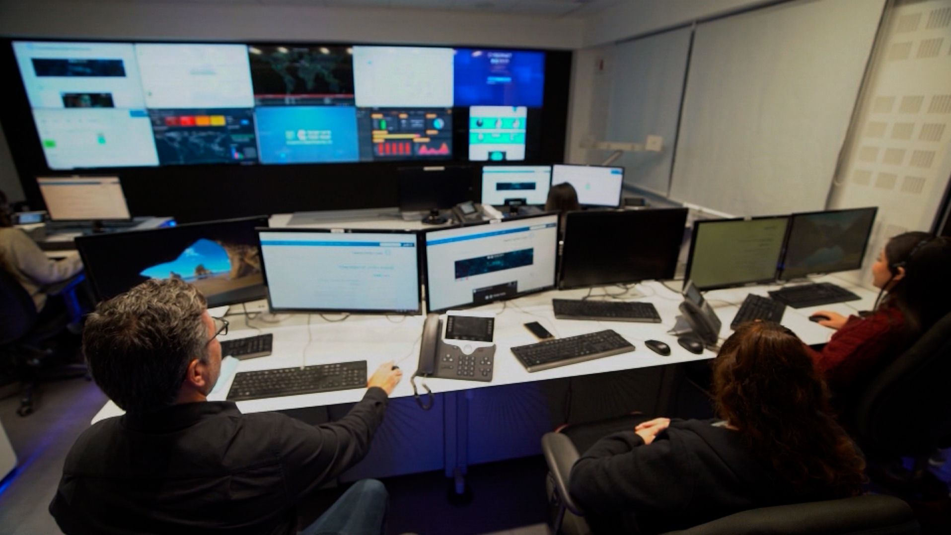 Cyber defense system agents monitor for incoming cyber attacks in Be'er Sheva, Israel. 