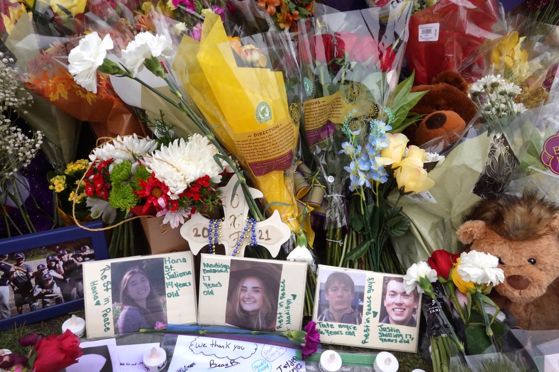 A memorial outside of Oxford High School  on December 3, 2021, in Michigan. Four students were killed on November 30, when student Ethan Crumbley allegedly opened fire.