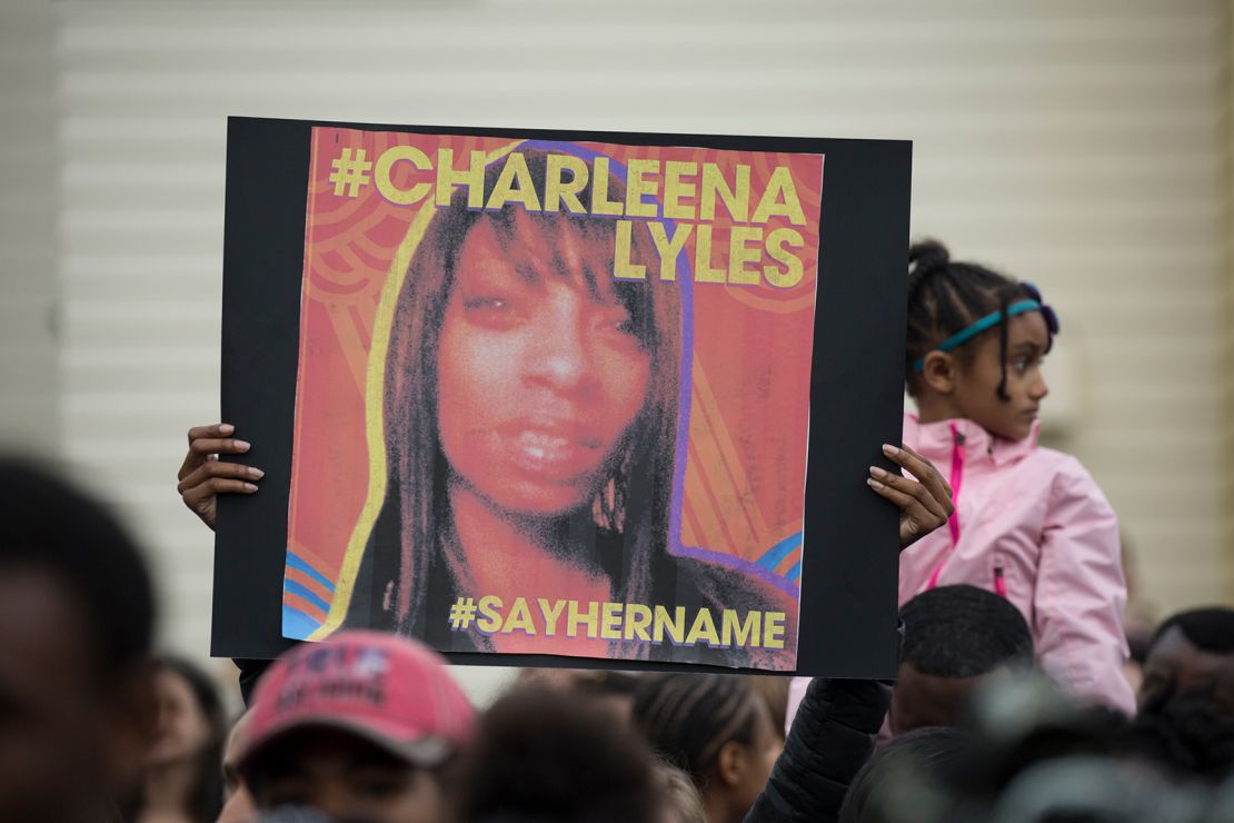 A woman holds a sign in honor of Charleena Lyles during a protest and rally in honor of Lyles on June 20, 2017, in Seattle, Washington. 