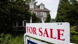 A for sale sign stands in front of a house, in Jenkintown, PA, on June 8, 2018.
