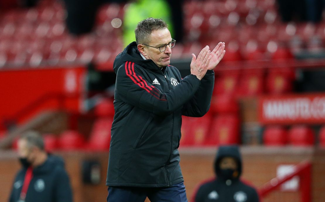 Ralf Rangnick applauds the Manchester United crowd following the club's victory against Crystal Palace. 