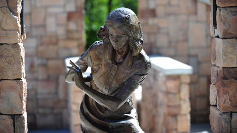 A bronze statue of Anne Frank by sculptor Greg Stone stands on the grounds of the Anne Frank Human Rights Memorial park in Boise, Idaho. 