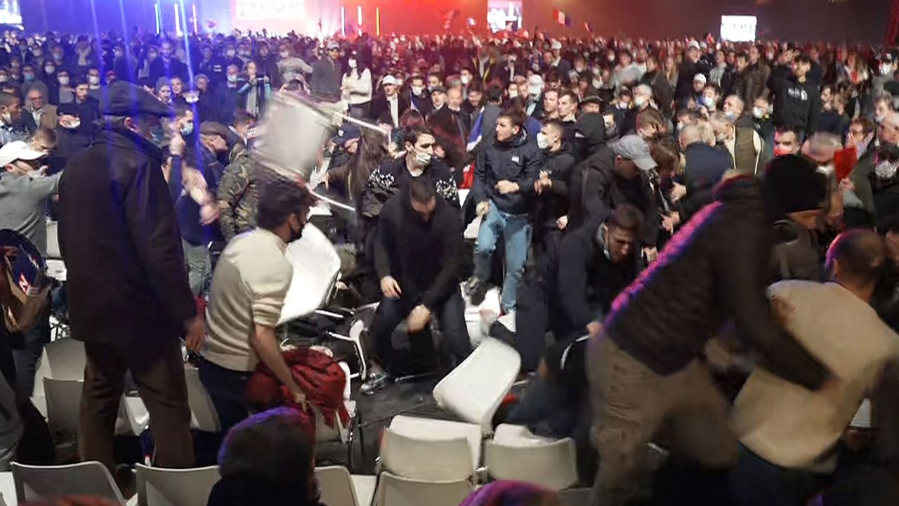 A video grab taken from an AFPTV footage shows SOS Racisme militants (movement against Racism) clashing with supporters of French far-right media pundit and 2022 presidential candidate Eric Zemmour at the end of a campaign rally held in Villepinte, near Paris, on December 5, 2021. (Photo by AFP) (Photo by COLIN BERTIER,AURELIA MOUSSLY,LAURA DIAB/AFP via Getty Images)