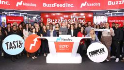 Founder and CEO of BuzzFeed Jonah H. Peretti and BuzzFeed are seen on stage as they are preparing to ring a bell during BuzzFeed Inc.'s Listing Day at Nasdaq  on December 06, 2021 in New York City. 