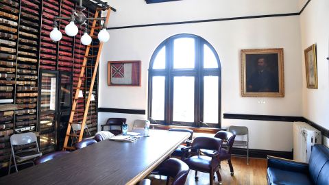 The UDC room (United Daughters of the Confederacy) is decorated with a Confederate flag, portrait of Jefferson Davis and other Southern memorabilia.