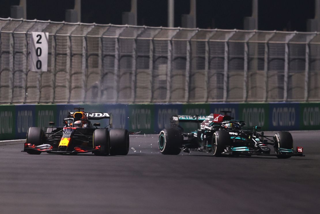 Max Verstappen and Lewis Hamilton crash on lap 37.