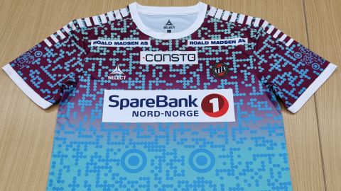 The shirts feature a QR code linking to a page detailing concerns about human rights violations.