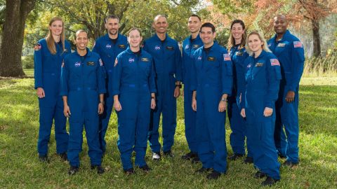 NASA's 2021 Astronaut Candidate Class includes (from left) US Air Force Maj. Nichole Ayers, Christopher Williams, US Marine Corps Maj. (retired) Luke Delaney, US Navy Lt. Cmdr. Jessica Wittner, US Air Force Lt. Col. Anil Menon, US Air Force Maj. Marcos Berríos, US Navy Cmdr. Jack Hathaway, Christina Birch, US Navy Lt. Deniz Burnham and Andre Douglas.