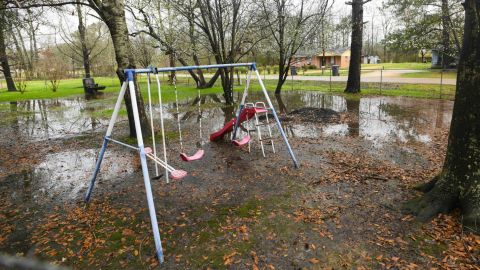 Heavy rains flood the front yard of a Lowndes County resident.