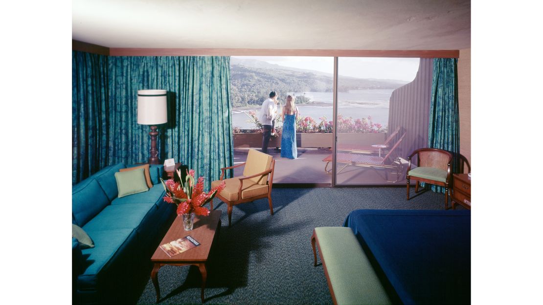 Photographer Arie deZanger captured the interior and exterior of this blue-tinged bedroom at the Tahara'a InterContinental in Tahiti.