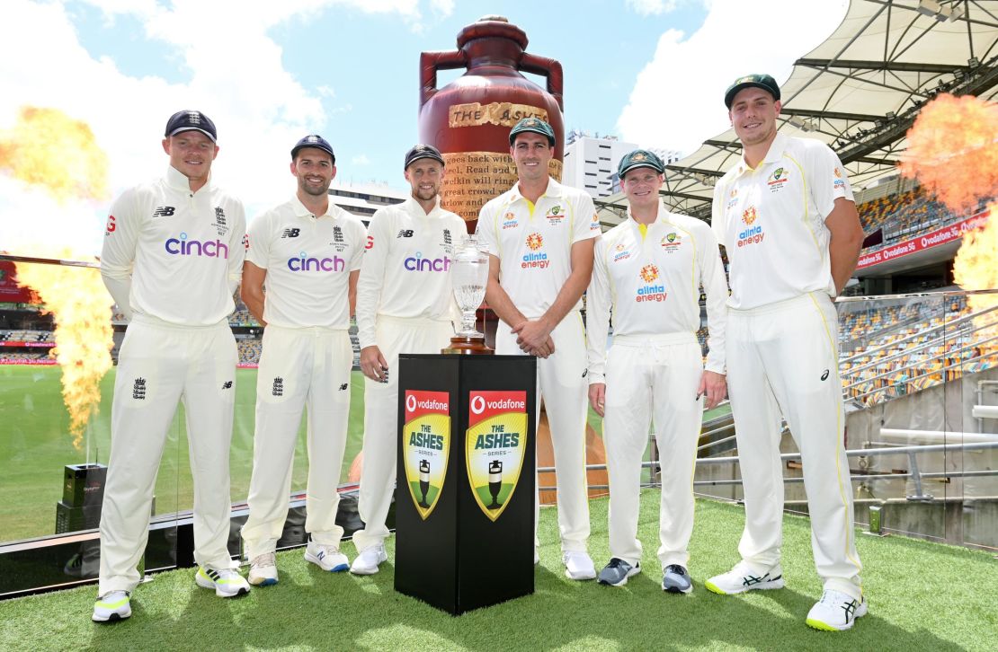 (Left to right) Ollie Pope, Mark Wood, Joe Root, Pat Cummins, Steve Smith and Cameron Green posing for a photo.