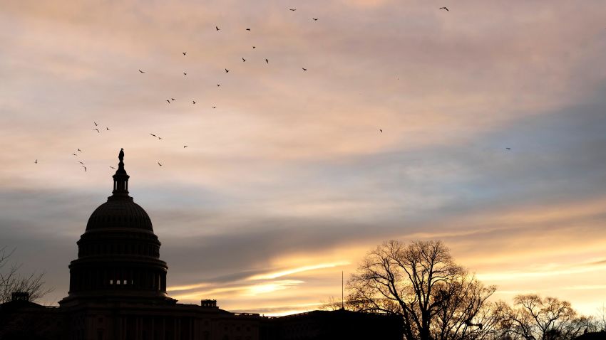 Morning sunrise illuminates the Capitol in Washington, Tuesday, Dec. 7, 2021. With Democrats holding a thin majority in Congress, passage of President Joe Biden's sweeping legislative agenda will be a challenge as negotiations continue in the 50-50 Senate.