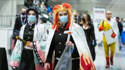 Costumed people attend Anime NYC at the Jacob K. Javits Convention Center in New York City on November 20, 2021. - Anime NYC is an annual three-day anime convention held during in New York City. 