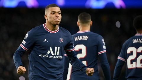 Kylian Mbappe celebrates after scoring his second goal against Club Brugge.