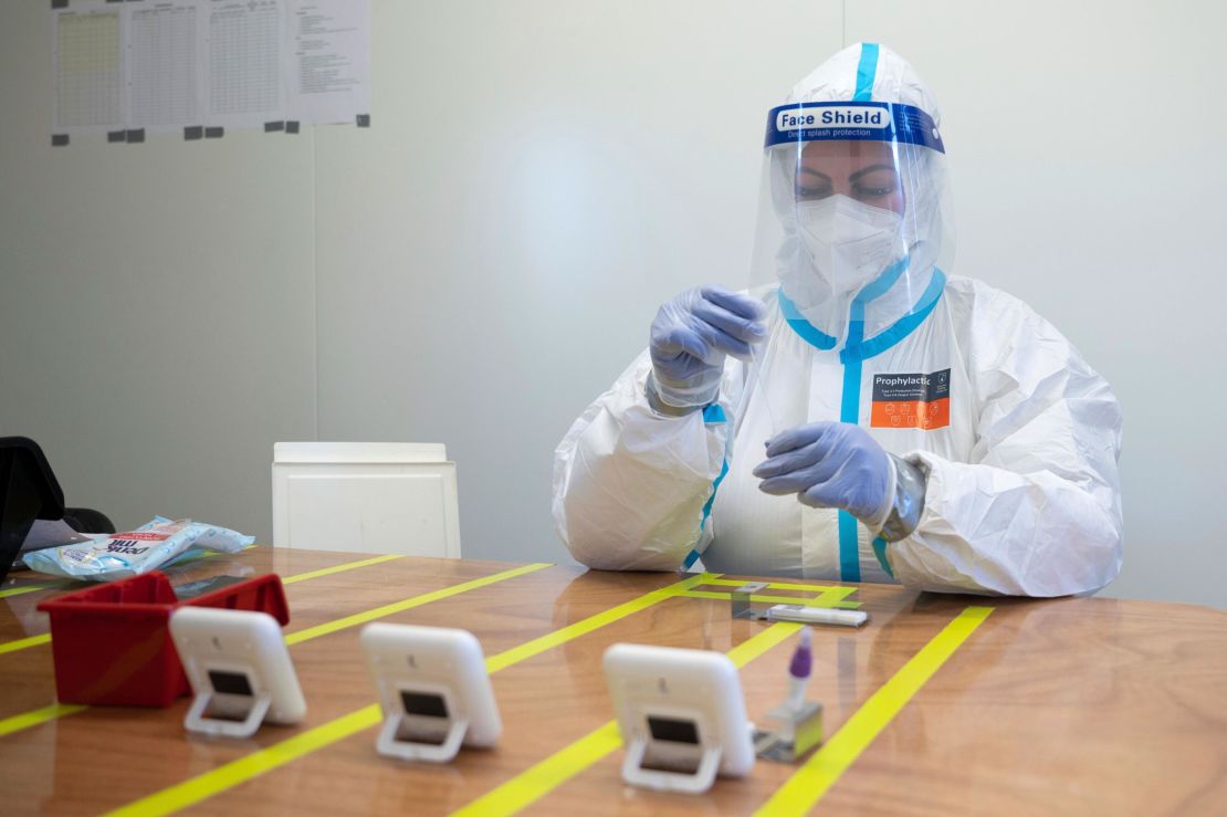 A worker evaluates a rapid Covid-19 test in Dresden, Saxony, on December 3. 