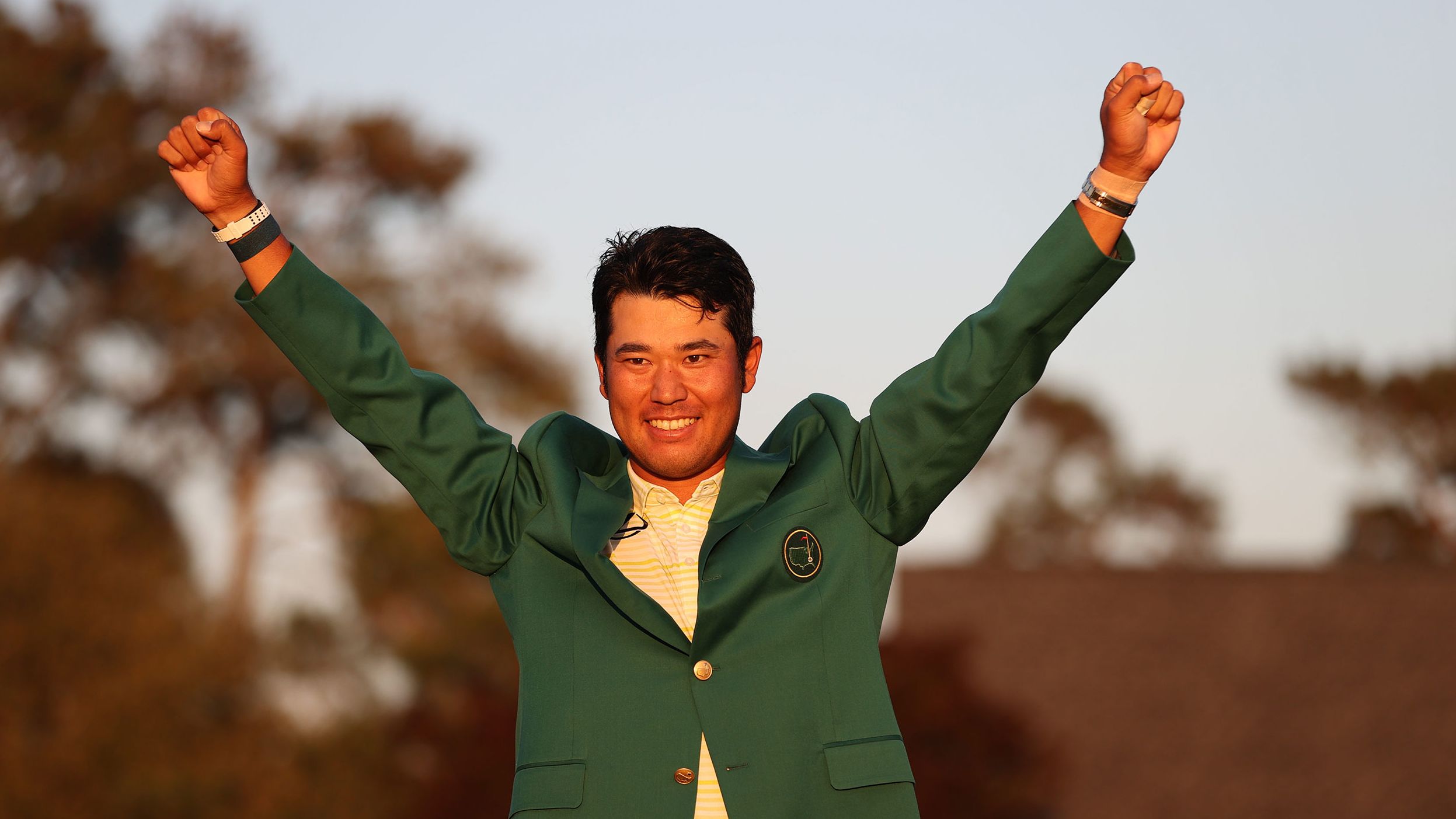 April 11: Hideki Matsuyama lifts his arms aloft in celebration after romping to victory at the Masters. He became the first Japanese man to win a major. 