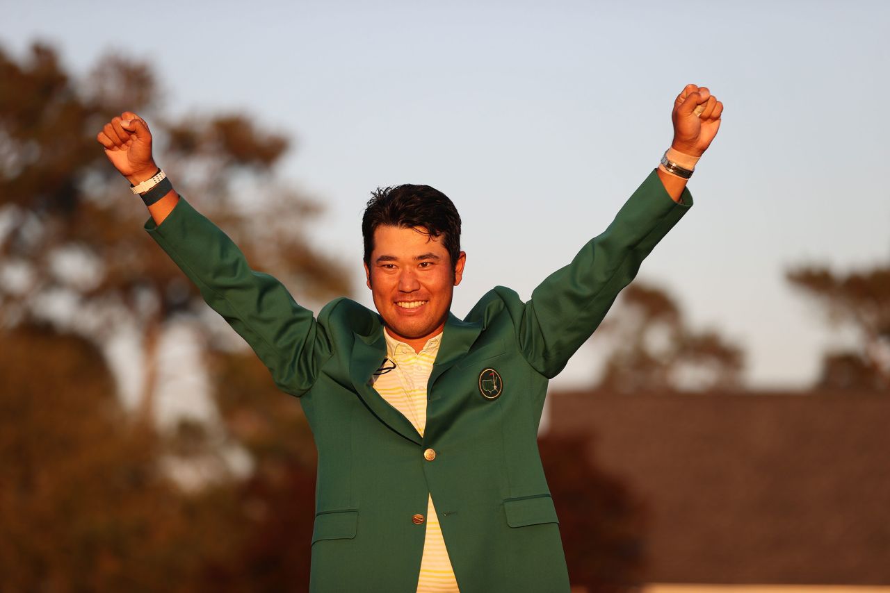 April 11: Hideki Matsuyama lifts his arms aloft in celebration after romping to victory at the Masters. He became the first Japanese man to win a major. 