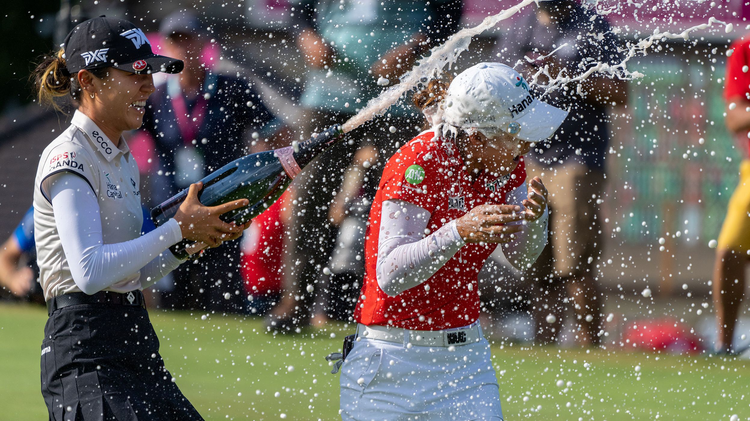 <strong>July 25: </strong>Minjee Lee is sprayed with champagne after winning the Evian Championship, her first major victory. She came from seven shots behind in the final round and secured victory on a playoff hole to complete the comeback. 