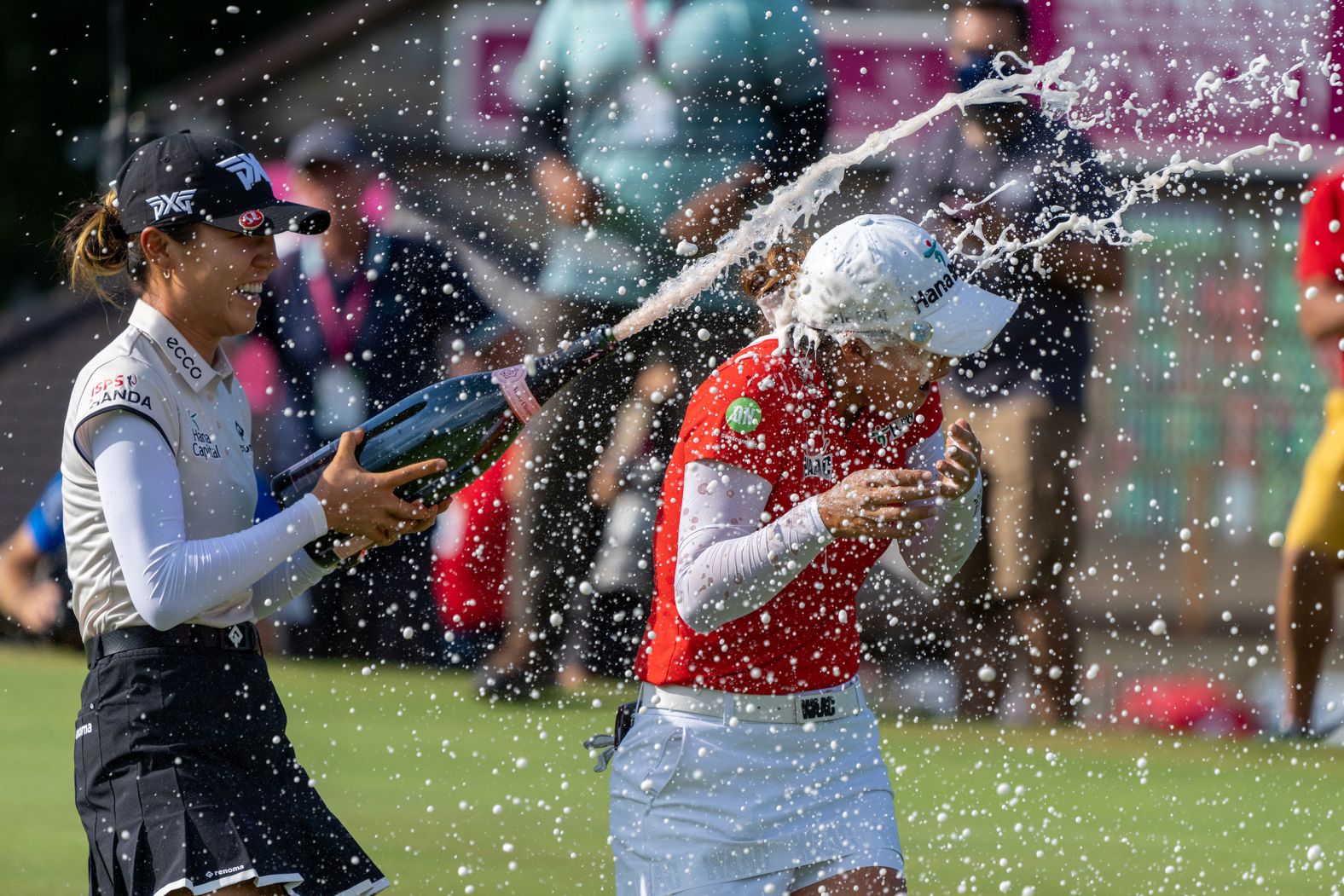 <strong>July 25: </strong>Minjee Lee is sprayed with champagne after winning the Evian Championship, her first major victory. She came from seven shots behind in the final round and secured victory on a playoff hole to complete the comeback. 