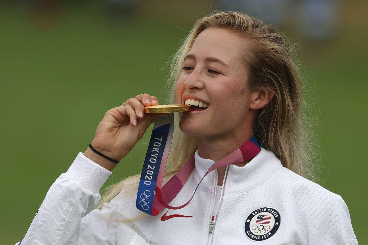<strong>August 7: </strong>Nelly Korda bites into the gold medal after claiming first place at the Tokyo 2020 Olympics. It continued her excellent season after winning her first major earlier in the year. 