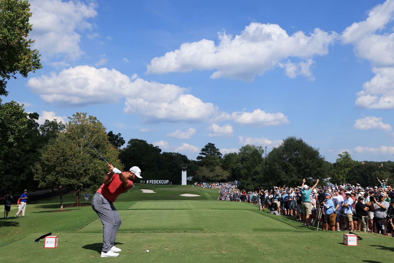 <strong>September 5:</strong> Jon Rahm plays his shot from the 11th tee during the final round of the Tour Championship at East Lake Golf Club. The Spaniard topped the PGA Tour rankings for earnings in 2021, taking home $7.7 million.