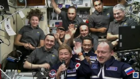Japanese private citizens Yusaku Maezawa, Yozo Hirano, and veteran Russian cosmonaut Alexander Misurkin posing with the International Space Station crew after hatch opening on December 8th, 2021.