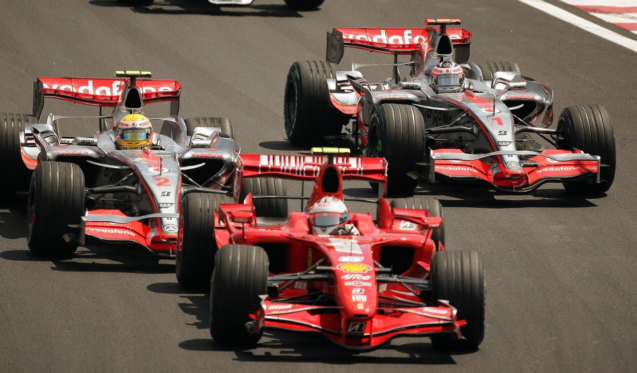 <strong>2007: </strong>Kimi Raikkonen (front) won the title by a point over Lewis Hamilton (L) and Fernando Alonso (R) in Brazil. Hamilton had led heading into the final day, but a gearbox problem meant he could only finish seventh, with Raikkonen taking pole to secure a famous win having arrived in Brazil in third place in the championship.