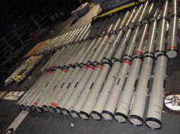 The Justice Department on Tuesday announced the forfeiture of two large caches of Iranian arms.
