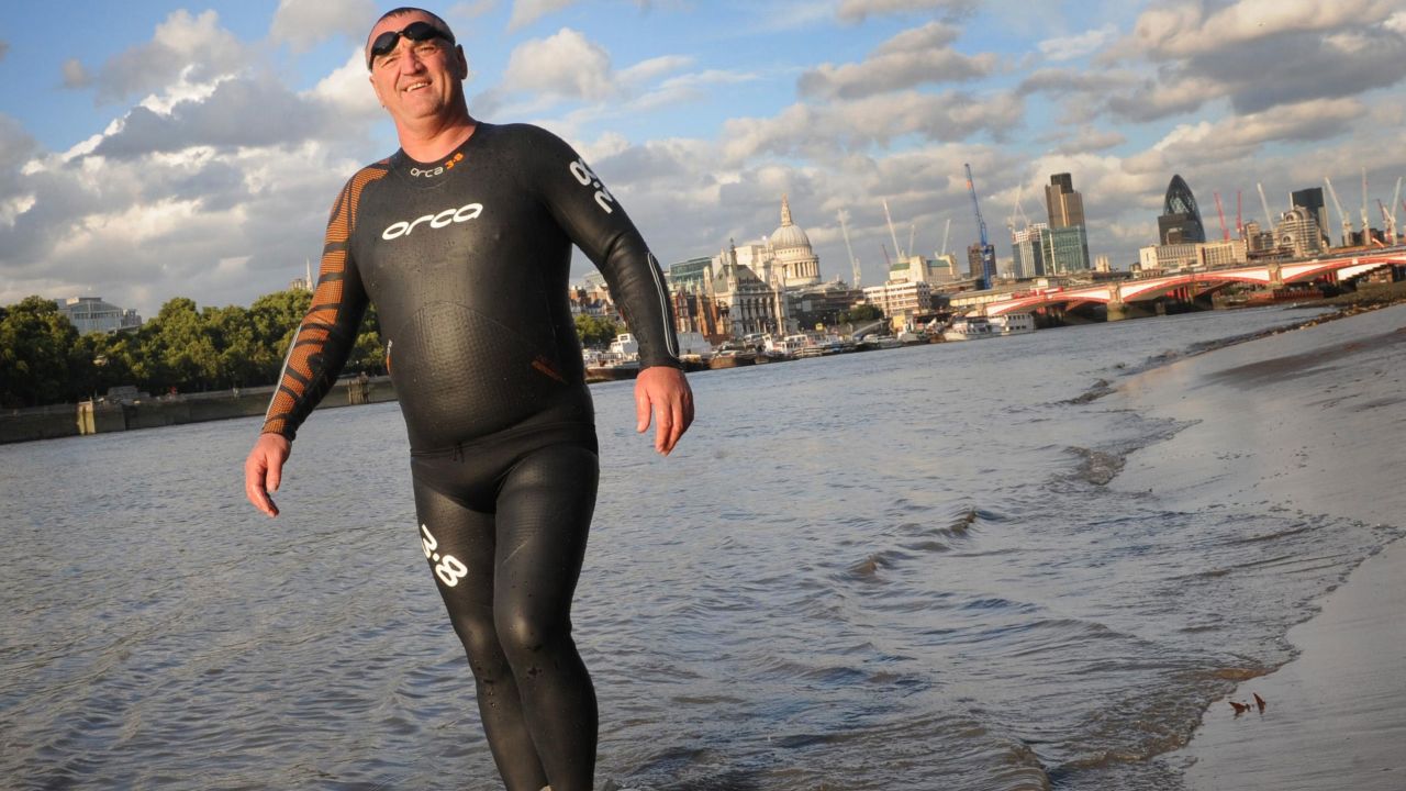 Strel emerging from London's River Thames in September 2009, to launch a film about his Amazon swim.