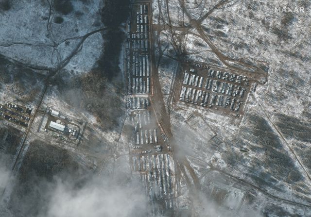 This satellite image shows Russian troops in Yelna, Russia, on November 9. <a href="index.php?page=&url=https%3A%2F%2Fwww.cnn.com%2F2021%2F11%2F04%2Feurope%2Frussia-ukraine-military-buildup-intl-cmd%2Findex.html" target="_blank">Satellite photos</a> taken that month revealed Russian hardware -- including self-propelled guns, battle tanks and infantry fighting vehicles -- on the move at a training ground roughly 186 miles (300 km) from the border.