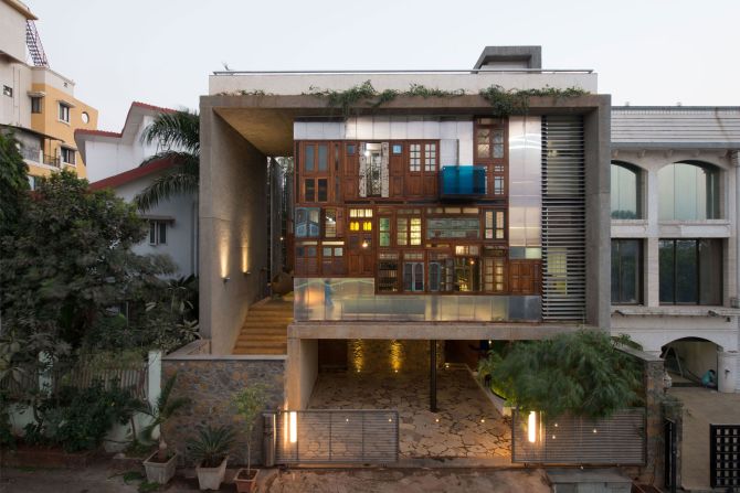 Located in Mumbai, India, <a href="index.php?page=&url=https%3A%2F%2Farchitizer.com%2Fblog%2Finspiration%2Fstories%2Farchitectural-details-collage-house%2F" target="_blank" target="_blank">Collage House</a> was constructed in 2015 by S+PS Architects. The facade of the building is made up of repurposed windows and doors from demolished buildings in the area, allowing plenty of natural light to filter in. The group also combined metal pipe leftovers to form a courtyard feature wall. 