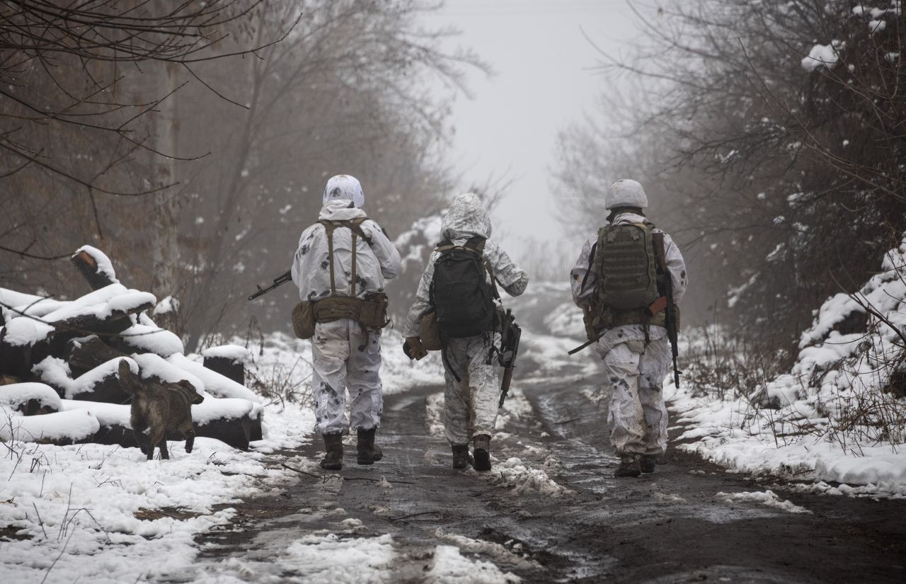 Ukrainian soldiers walk near Katerinivka on December 7.