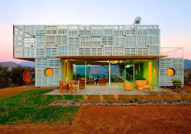 Using three shipping containers for its structure and recycled wood pallets as a facade, 85% of the materials that make up the <a href="index.php?page=&url=https%3A%2F%2Fjamesandmau.com%2Fprojects%2Finfiniski-manifesto-house%2F" target="_blank" target="_blank">Infiniski Manifesto House</a> -- located in Curacaví, Chile, and completed in 2009 -- are recycled. Architect Jaime Gaztelu integrated energy-saving technology in the design, reducing consumption by 70% through renewable water and space heating, and using cellulose extracted from unread newspapers as insulation.