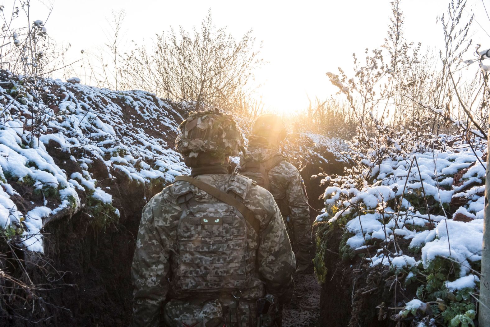 Ukrainian soldiers walk in a trench along the front line in Avdiika, Ukraine, on Thursday, December 2.