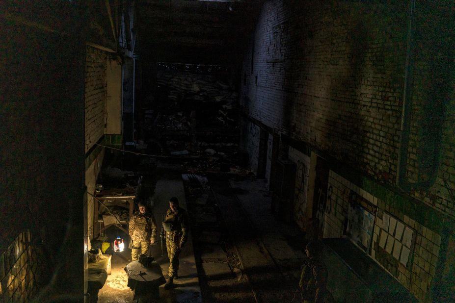 Ukrainian soldiers are seen at a base built into the skeletal remains of a tire factory in Avdiivka on December 1.