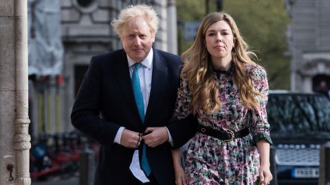 Johnson and Carrie, then his fiancee, walk to a polling station at Methodist Central Hall in London to cast their votes in local elections on May 6, 2021.