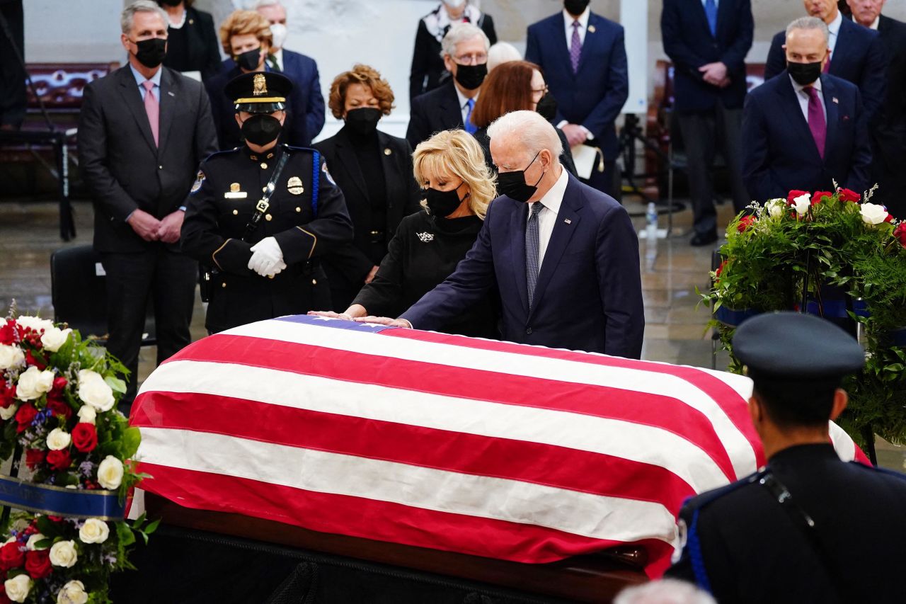 President Biden and first lady Dr. Jill Biden pay their respects as Dole lies in state.