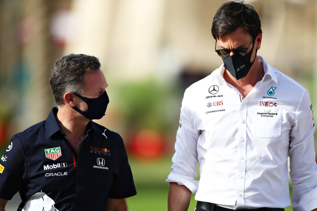 Christian Horner and Toto Wolff talk in the paddock ahead of the Bahrain Grand Prix.