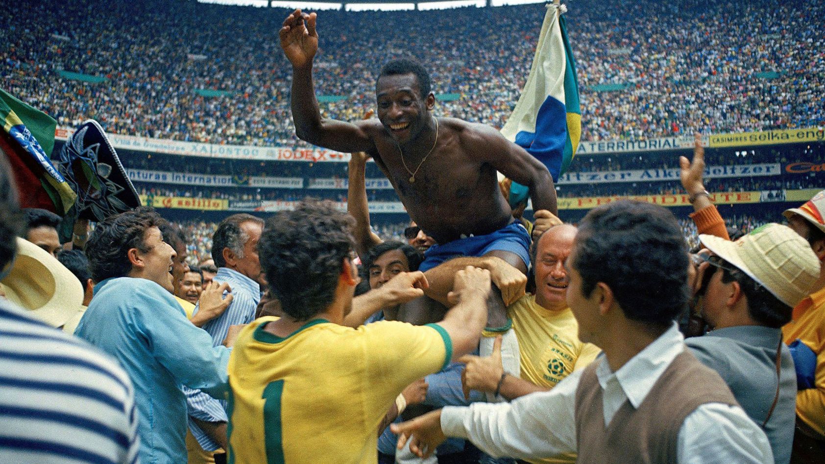 Pelé is carried off the field by fans after Brazil defeated Italy in the final of the 1970 World Cup.