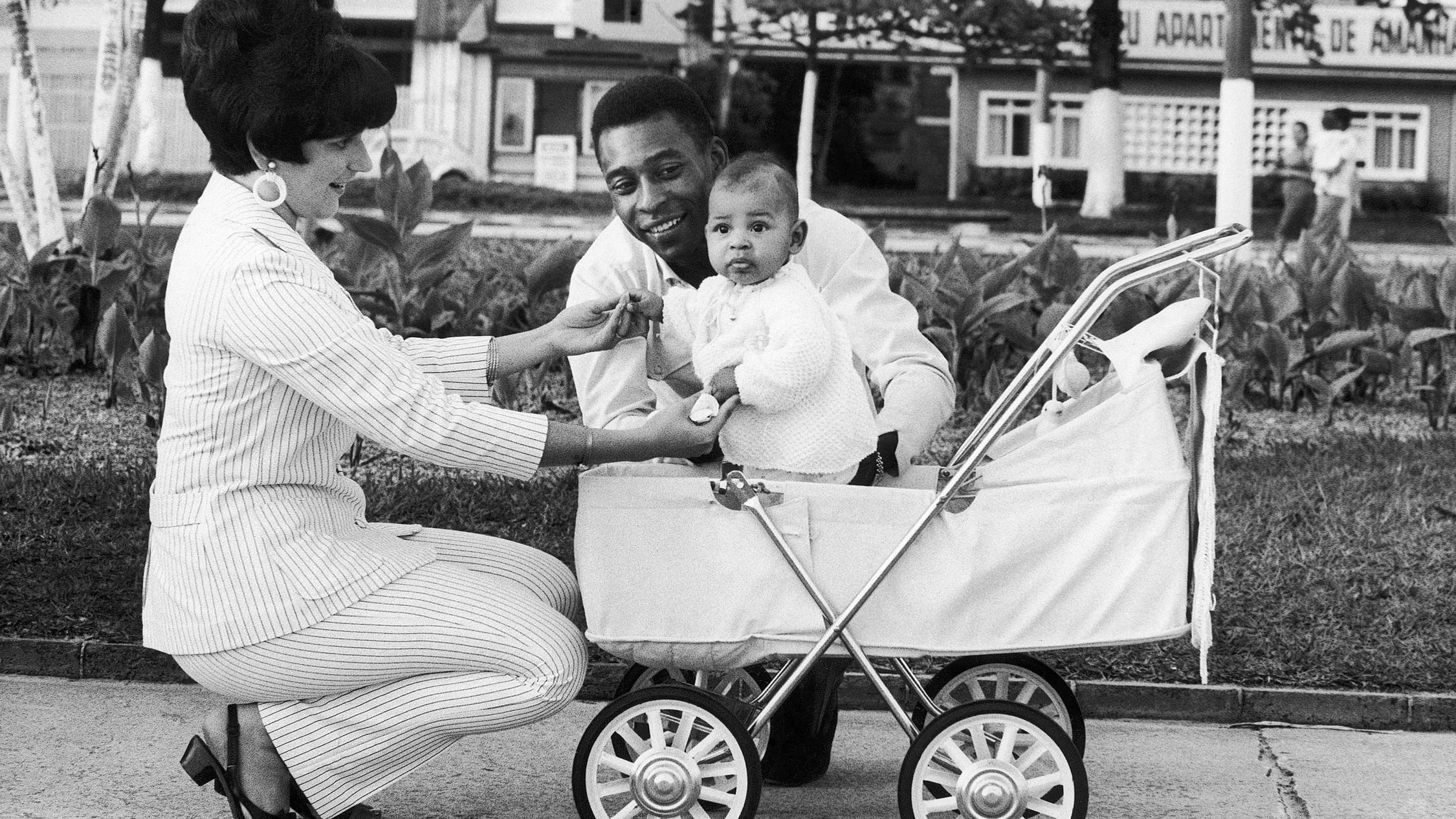 Pelé and his wife, Rosemeri, take their young daughter, Kely, out for a walk in 1967. It was their first child together. They would have three children in all before divorcing in 1978.