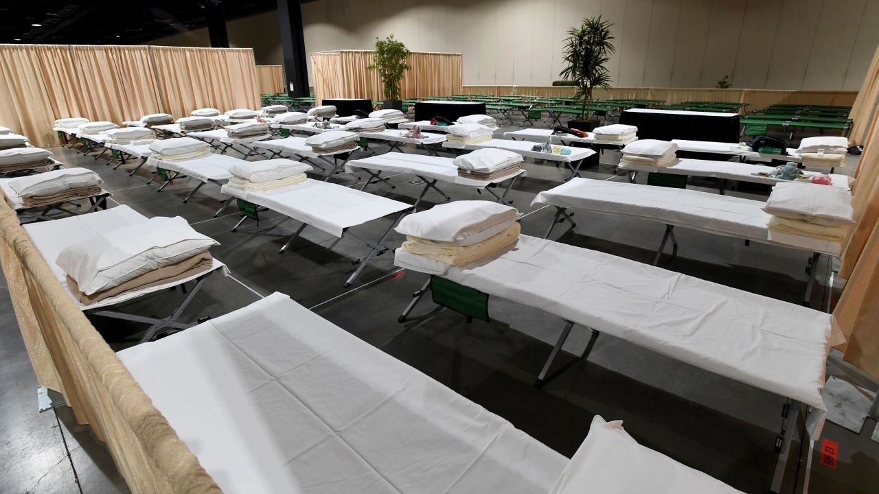 Sleeping quarters set up inside Exhibit Hall B for migrant children are shown during a tour of the Long Beach Convention Center on April 22, 2021 in in Long Beach, California.