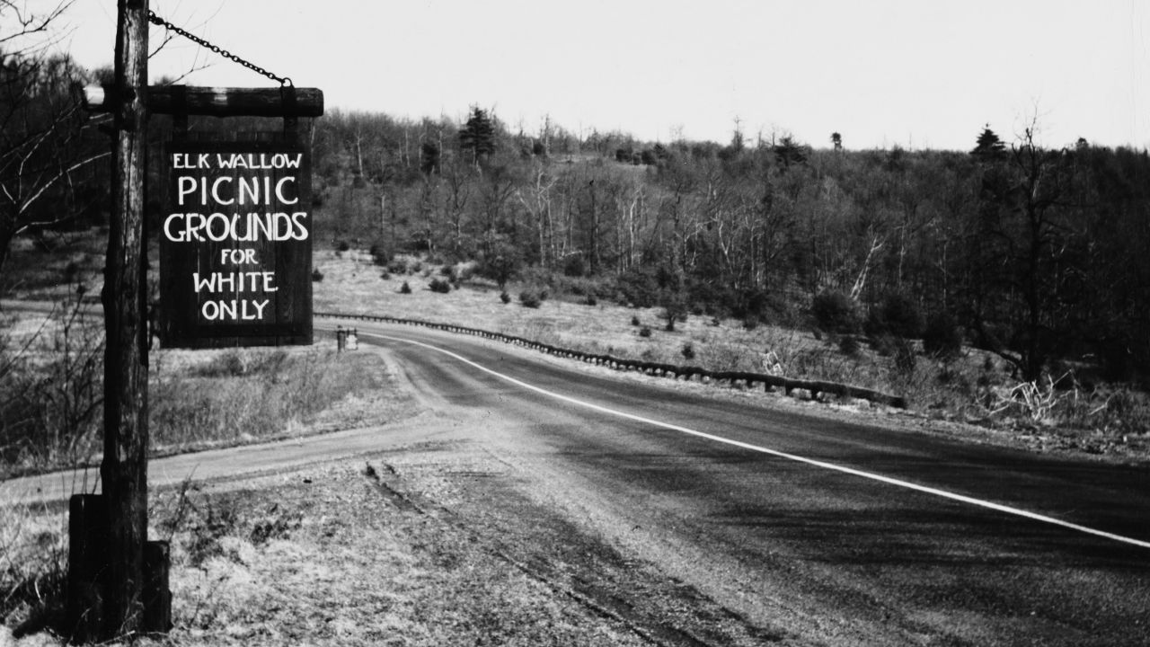 A sign at Elkwallow Picnic Grounds in Shenandoah National Park, Virginia, reads "Picnic grounds for white only."