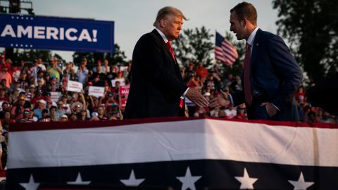 Former President Donald J. Trump speaks with Republican congressional candidate Max Miller at a rally at the Lorain County Fairgrounds in June in Wellington, Ohio.