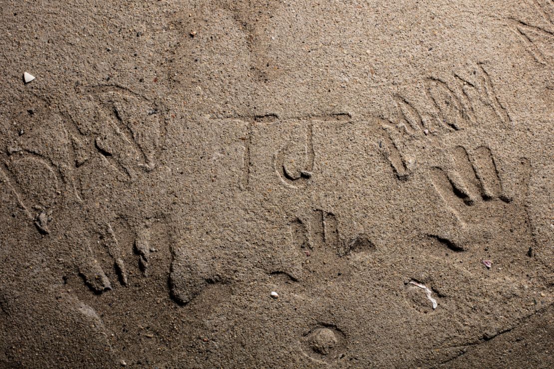 Handprints are seen on a memorial plaque at a playground dedicated to Sandy Hook victim Jessica Rekos in Fairfield, Connecticut. Families of the victims collaborated on the playgrounds.